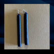 Two black chime candles