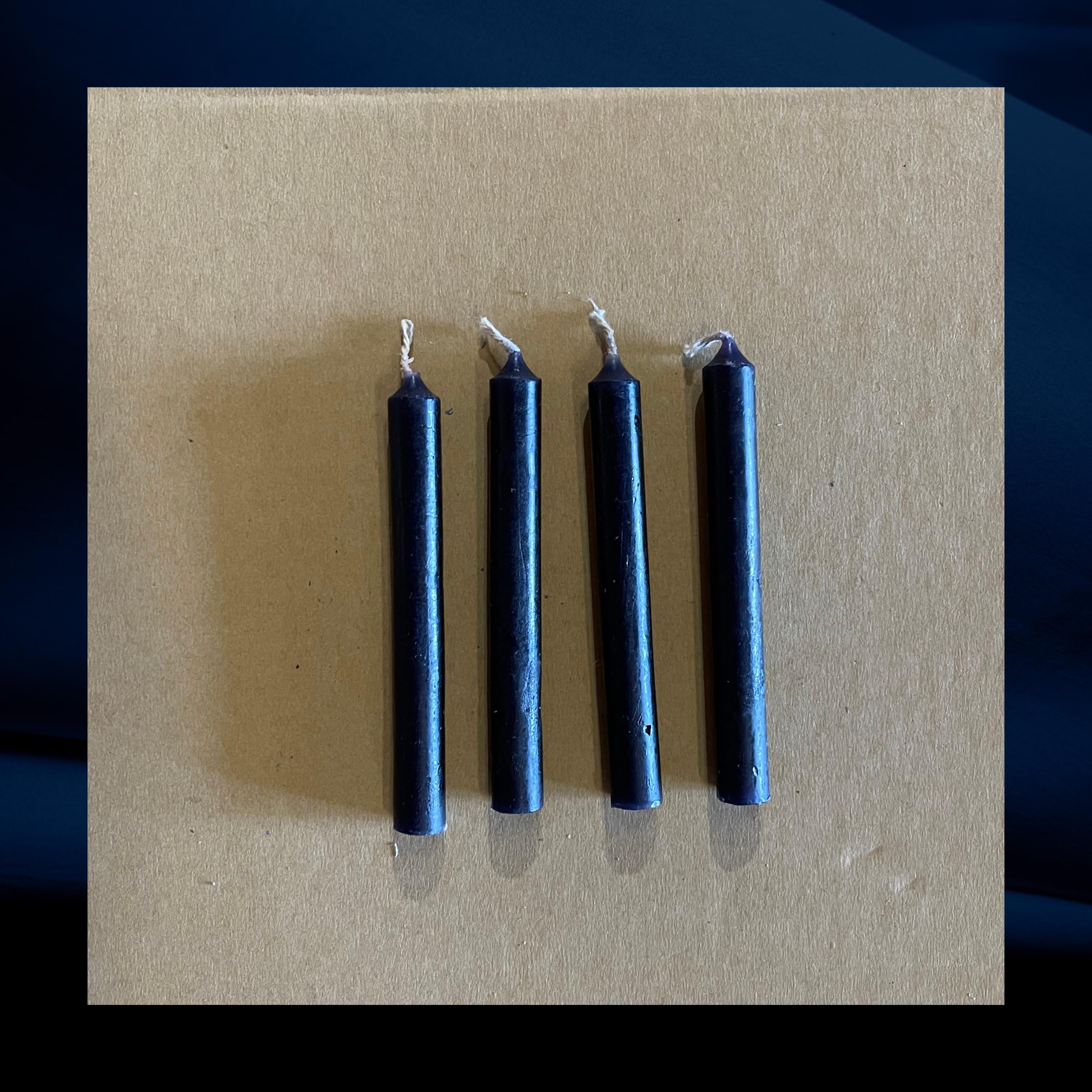 Four black chime mini candles