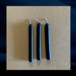 three black mini chime candles